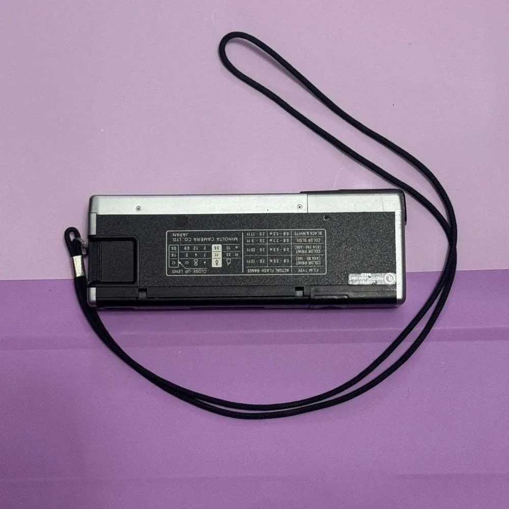 Minolta Autopak 450E 110 Film Camera Black Built-In Flash Vintage Untested